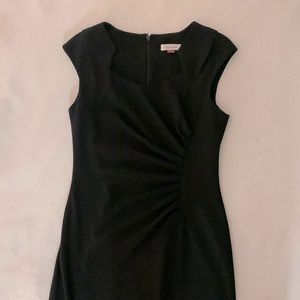 Black sheath dress by Calvin Klein - size 4 - interesting cut out neckline